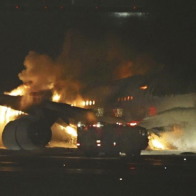 Planes collide and catch fire at Japan's busy Haneda airport, killing 5. Hundreds evacuated safely